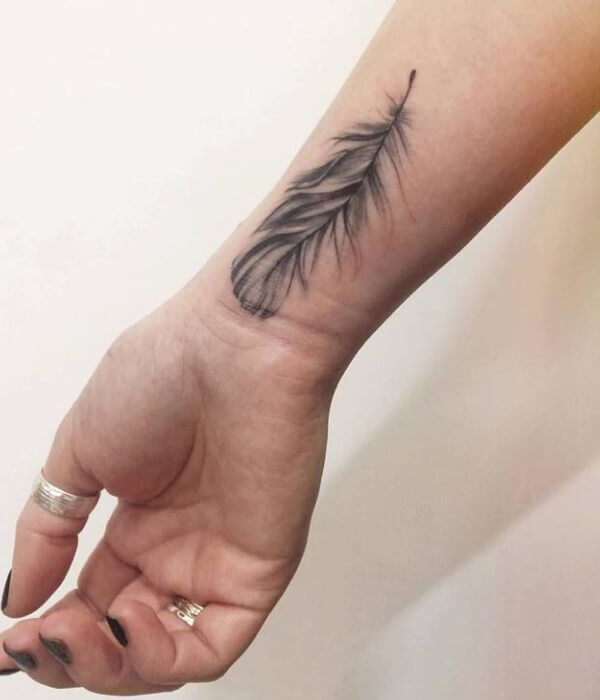 Classy Swift Feather Tattoo