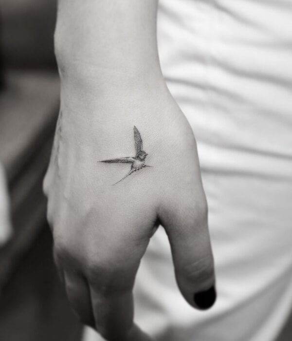 Flying Bird Palm Tattoo