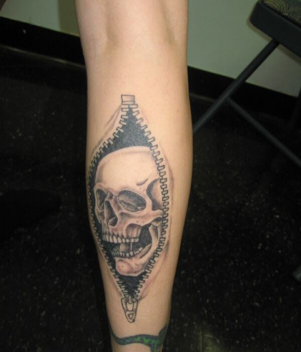 Gray skulls in zipper tattoo ideas