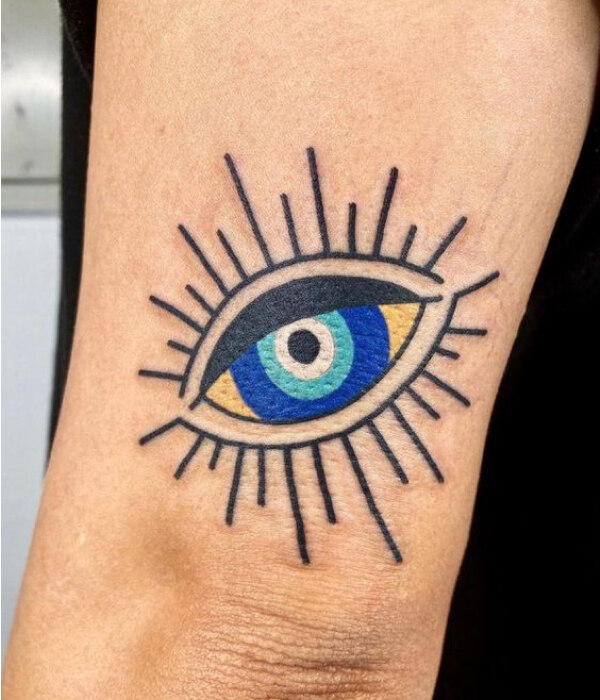 Yellow Evil Eye Tattoo