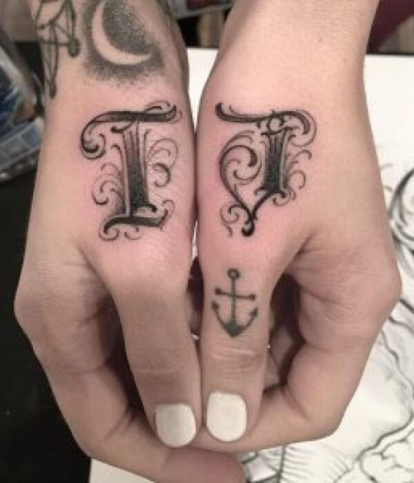 Ambigram T letter tattoo