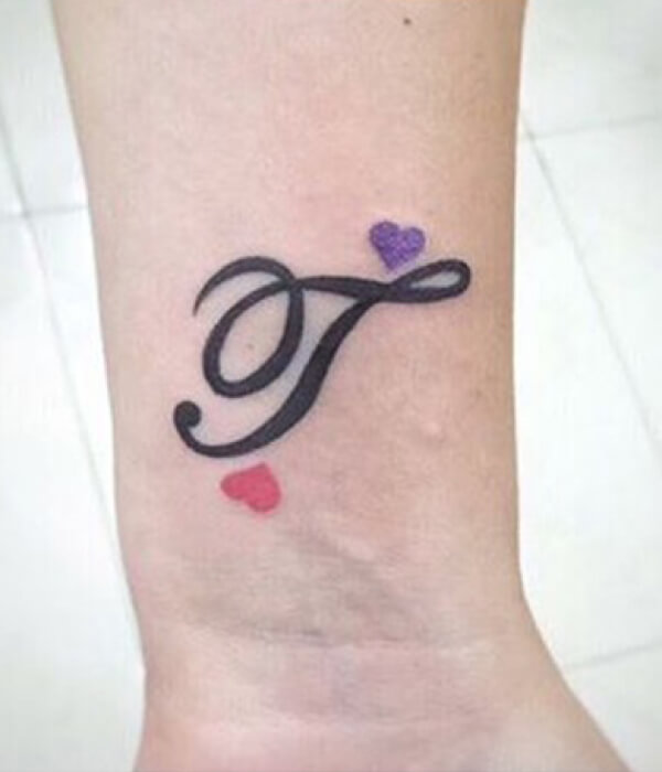 Classic Calligraphy T letter tattoo