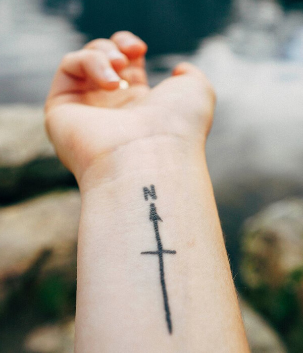 Traveler’s T tattoo