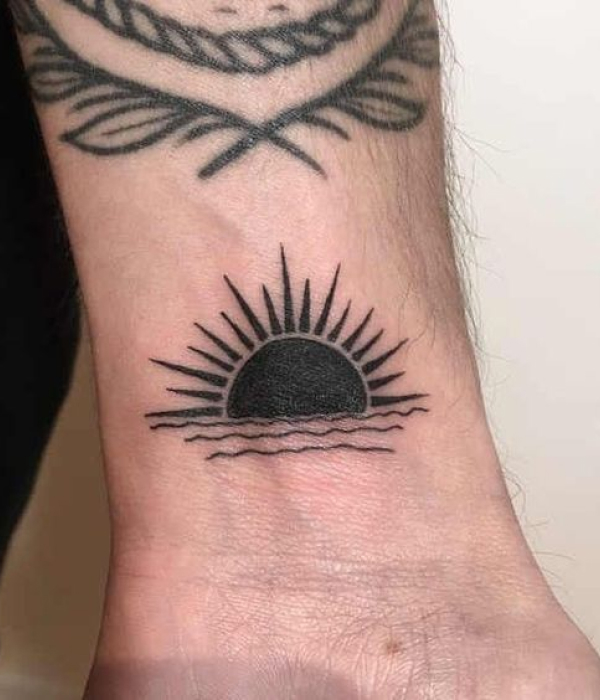Tribal Sunset Tattoo for men
