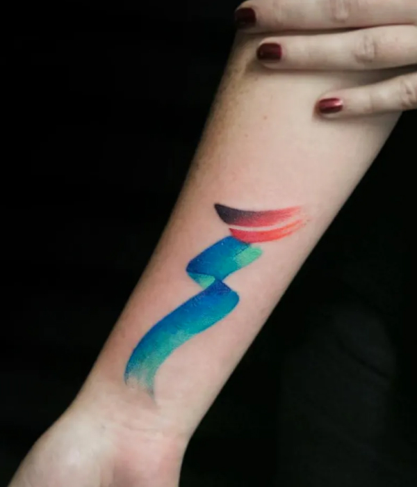 Watercolor T tattoo