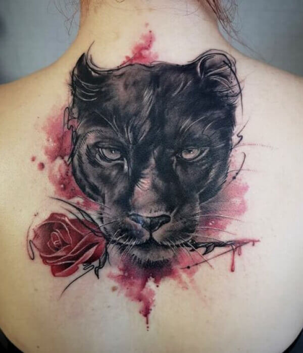 A panther with a rose clenched in its teeth