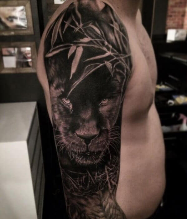 Snarling Panther face with intense eyes Tattoo For Men