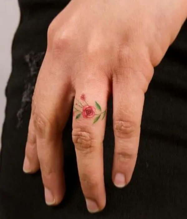 Delicate Red Rosebud on Ring Finger