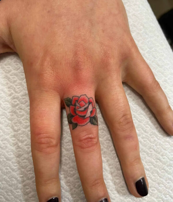 Rose Stem Wrapping Around Ring Finger