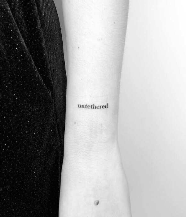 Untethered One Word Tattoo
