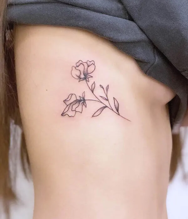 January Birth Flower Rib Tattoo