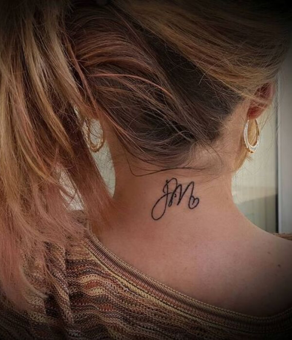 Letter M Tattoo On Back