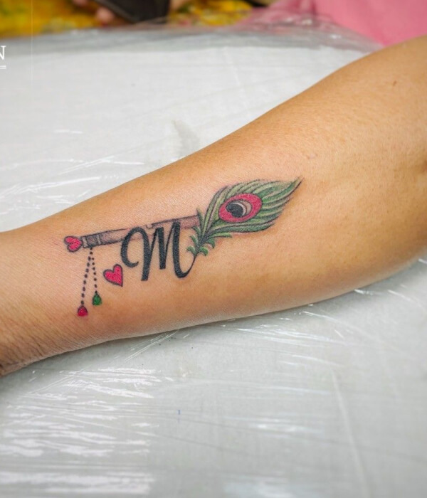 Letter M Tattoo With Feather