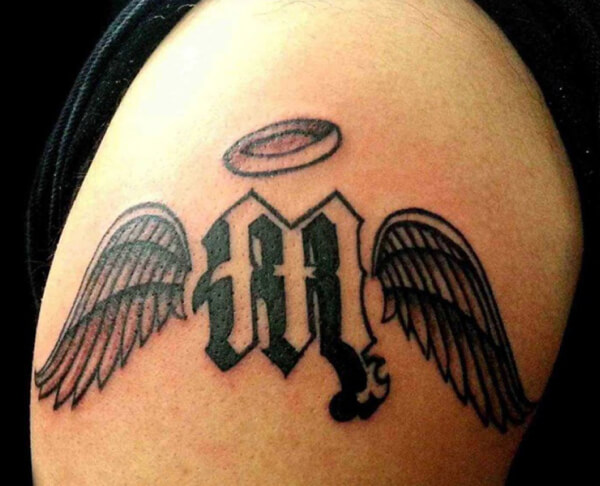 Letter M Tattoo With Wings On Shoulder