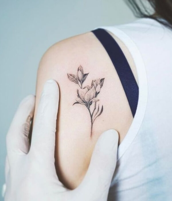 Simple Magnolia Tattoo