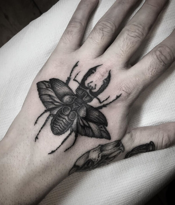 Beetle Hand Tattoo