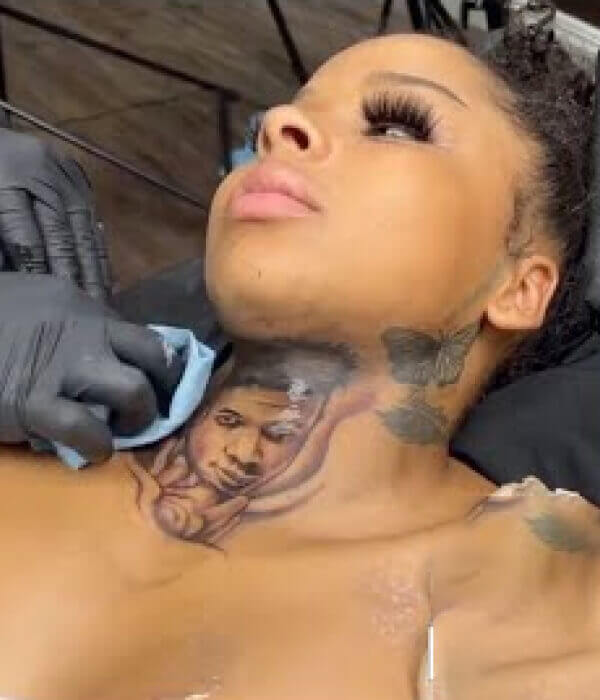 Butterfly Tattoo on the Side of Her Neck: Chrisean Rock Tattoo