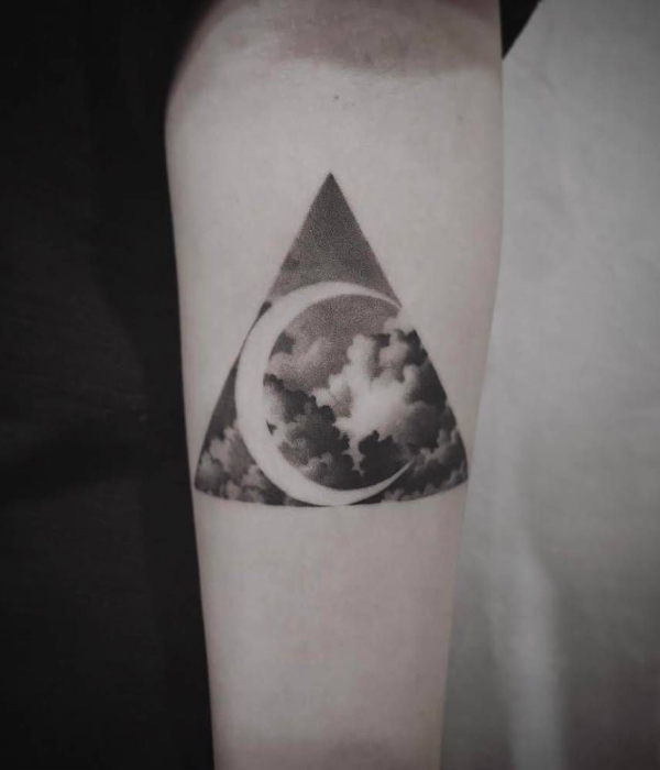 Cloud And Moon Negative Space Tattoo