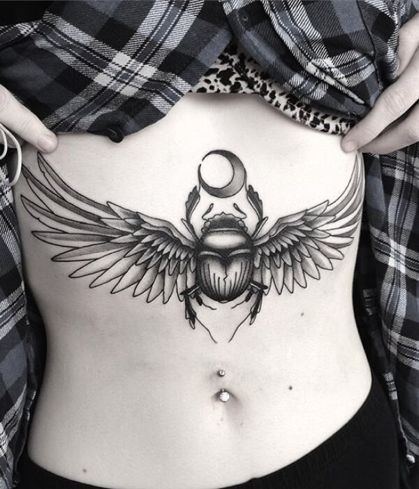 Dotwork Scarab Tattoo on a Woman’s Sternum