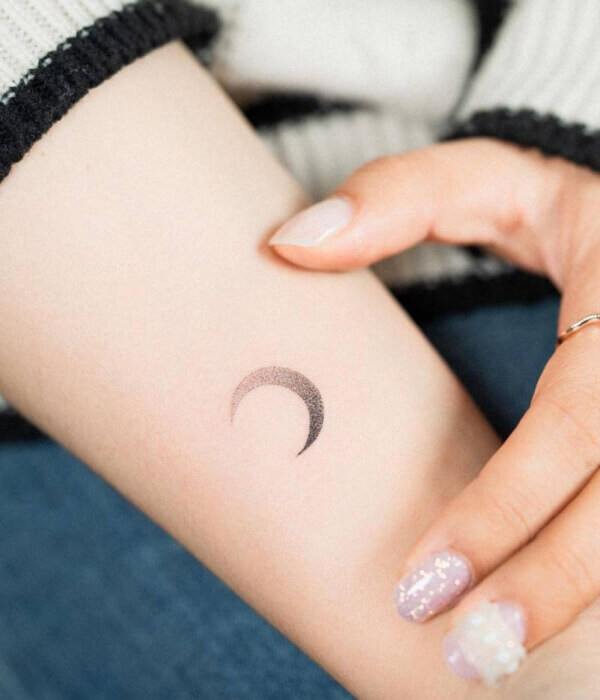 Minimalist Crescent Moon Tattoo