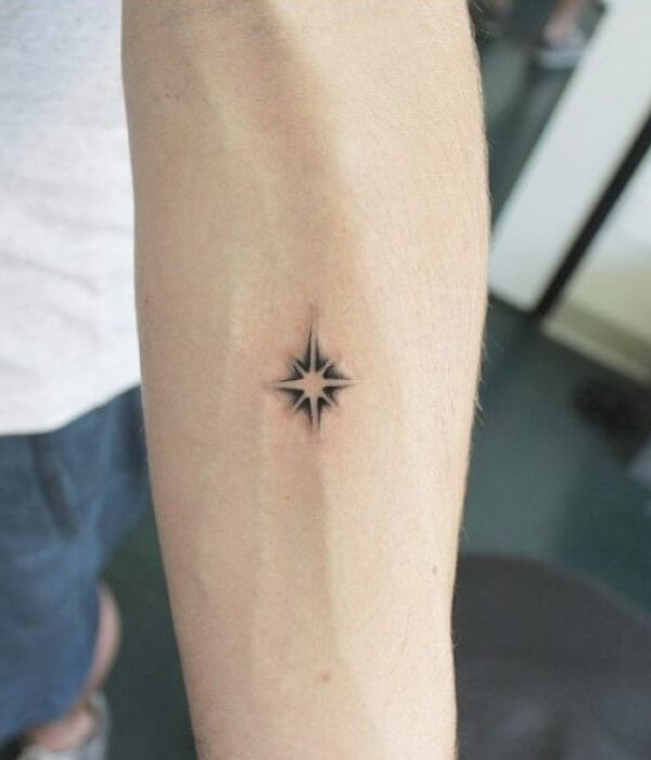 Negative Space Star Tattoo