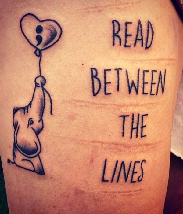 Reading between the lines tattoo