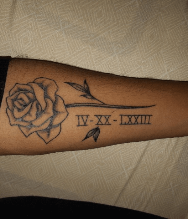 Rose Tattoo With Anniversary Date on hand