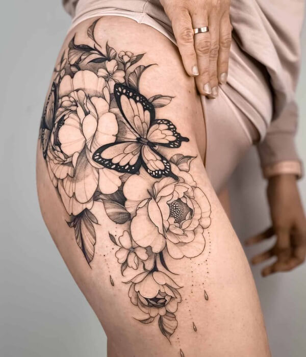 Artistic Butterfly Thigh Tattoo