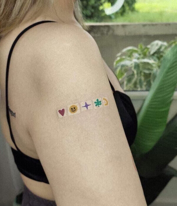 Colorful Micro Emoji Tattoo On Arm