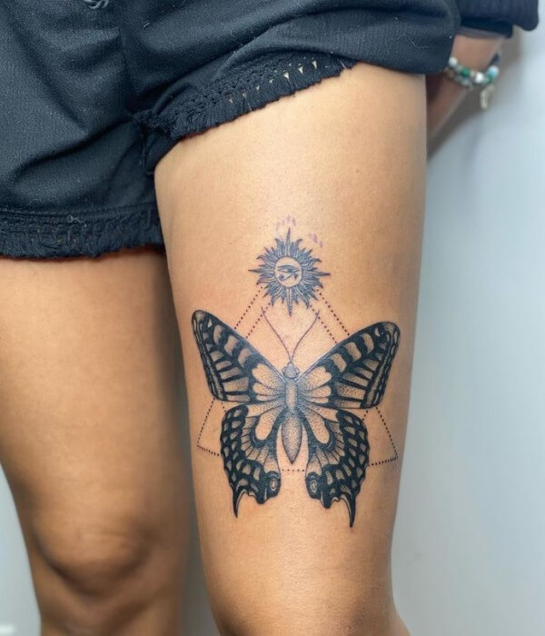 Cultural Butterfly Thigh Tattoo
