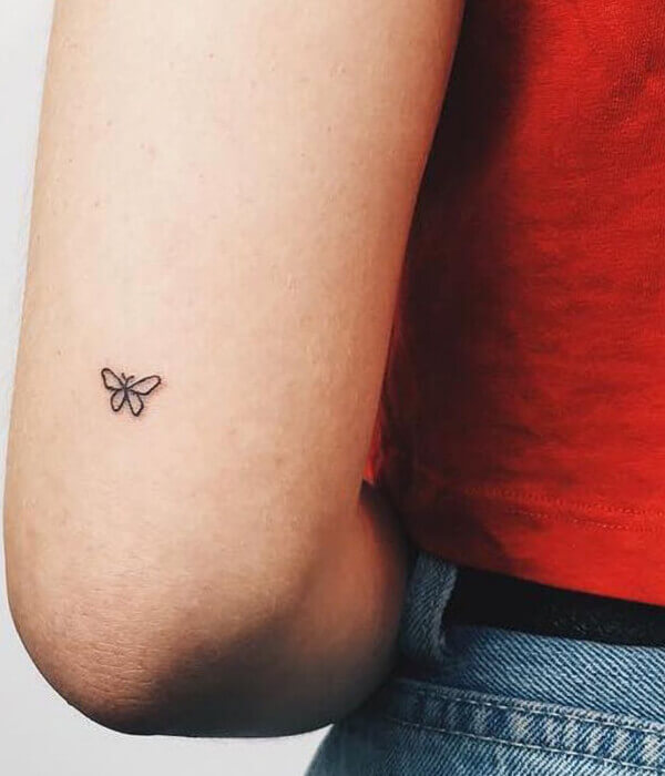 Micro Butterfly Tattoo