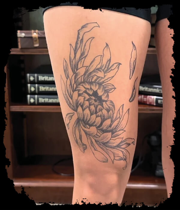 chrysanthemum flower tattoo on leg