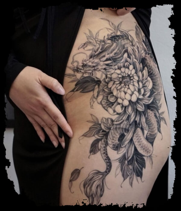 chrysanthemum tattoo on thigh