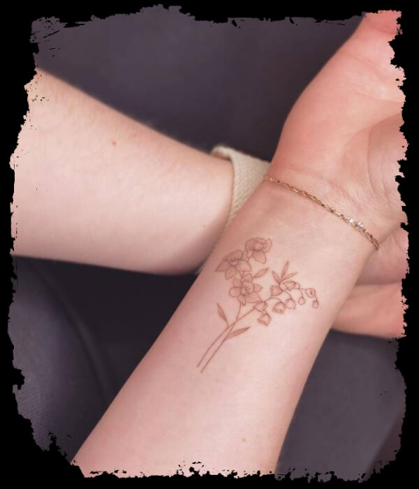 Lily-Of-The-Valley-Tattoo-on-wrist