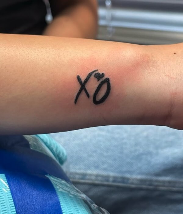 X and O Tattoo on Wrist - Trending Tattoo X-and-O-Tattoo-on-Wrist