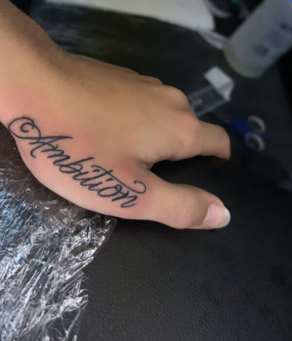 Name Tattoo on Thumb