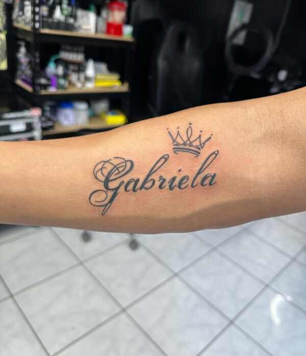 6. Crowned Name Tattoos