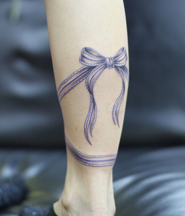 Bow Tattoo on Calf