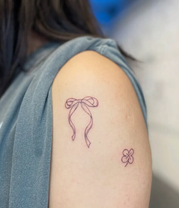 Bow Tattoo on Shoulder Blade