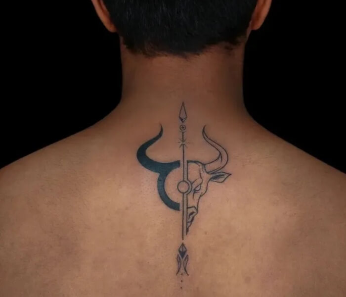 Nape Zodiac Sign Tatto Ideas - Trending Tattoo Minimalist zodiac bull symbol tattoo on the nape of the neck with a vertical geometric spear design in black ink.