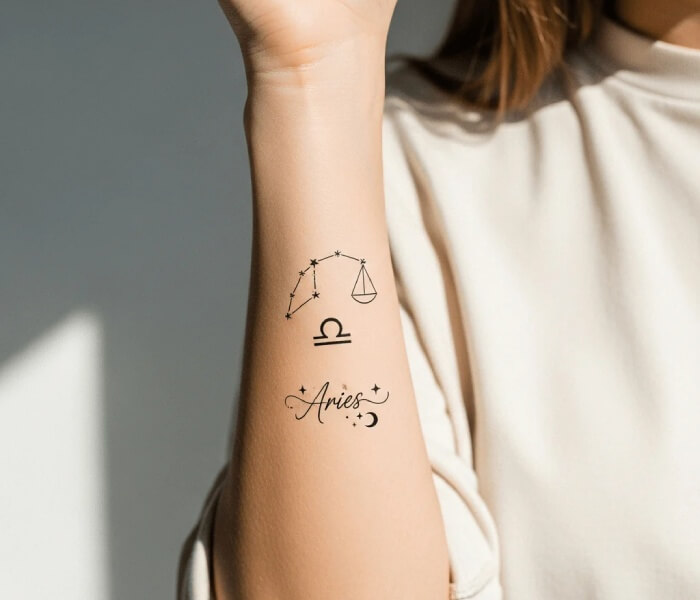 Tiny Zodiac Tattoos with Minimal Text - Trending Tattoo Minimal zodiac tattoo on inner forearm featuring a constellation, Libra symbol, and the word “Aries” in elegant script.